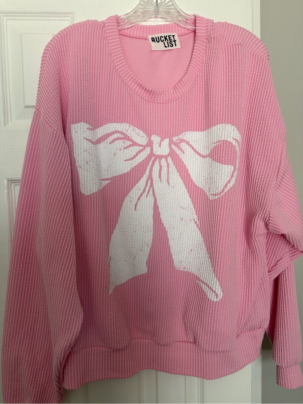 BUCKETLIST Pink Waffle Knit Sweater with White Bow Graphic